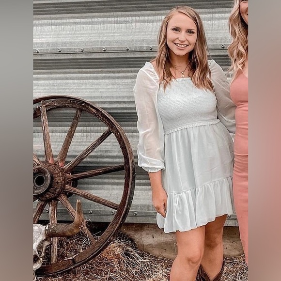 Bohen Smocked Mini Dress in Baby Blue. - Picture 1 of 3